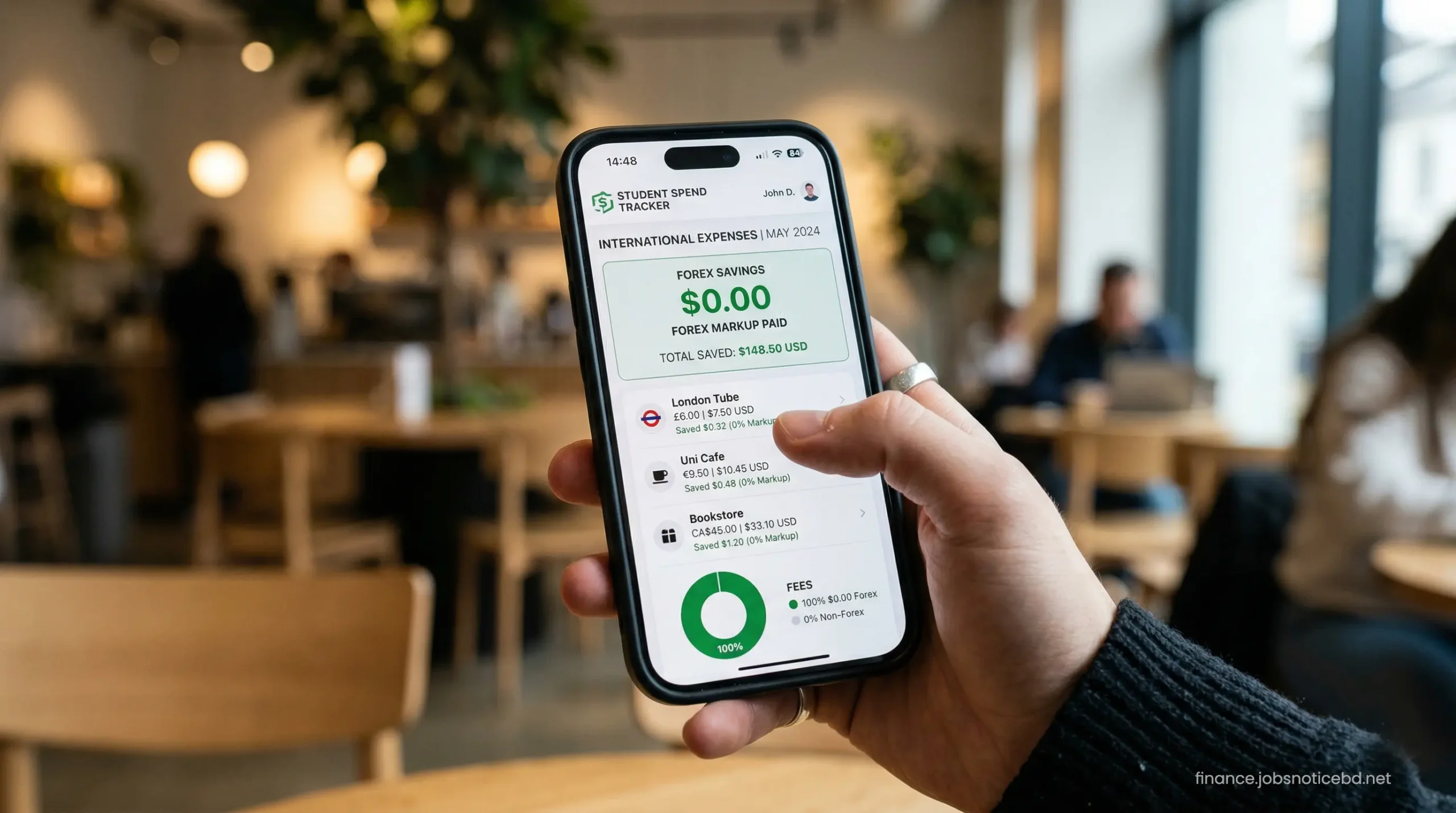 A close-up of a smartphone screen showing a student budget management and currency conversion app.